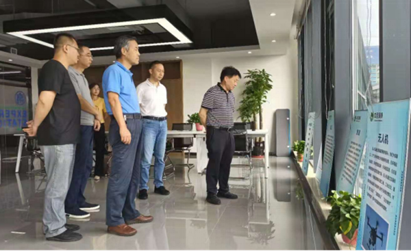 1627272036537866EfhN.png 熊良虎指導(dǎo)秦創(chuàng)原1_副本.png